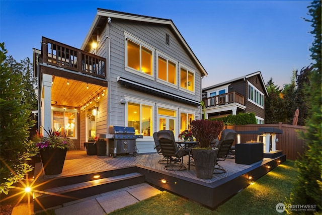 6511 108th Ave NE Unit 3, Kirkland, WA 98033 - rear view of property with a balcony, outdoor dining space, and a deck