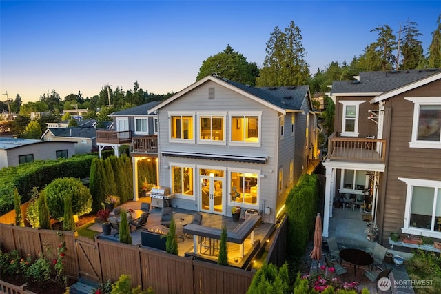 6511 108th Ave NE Unit 3, Kirkland, WA 98033 - rear view of house featuring a balcony and a gate