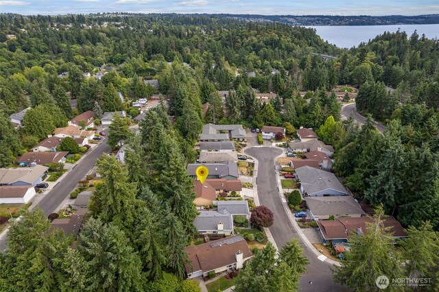 24812 12th Ave S, Des Moines, WA 98198 - aerial view of property and surrounding area featuring a forest and nearby suburban area