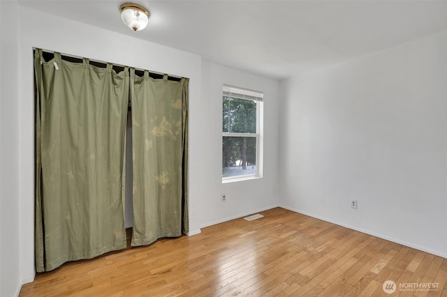 34716 4th Pl S, Federal Way, WA 98003 - unfurnished room with light wood-style flooring and baseboards