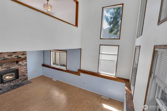 34716 4th Pl S, Federal Way, WA 98003 - unfurnished living room featuring wood finished floors and a high ceiling