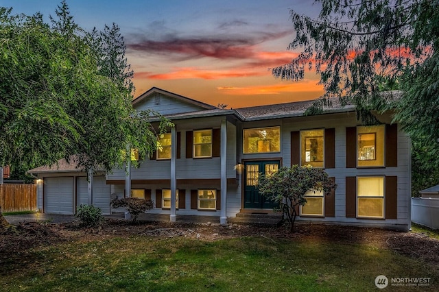 34716 4th Pl S, Federal Way, WA 98003 - back of property at dusk featuring a garage