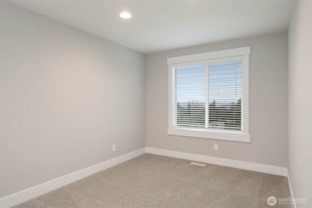7560 S 130th Pl, Seattle, WA 98178 - empty room featuring carpet flooring and recessed lighting