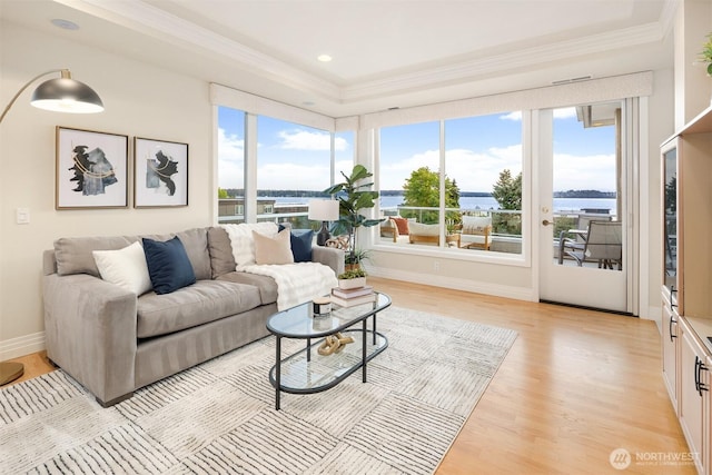 6424 Lake Washington Blvd NE Unit 34, Kirkland, WA 98033 - living room featuring ornamental molding, light wood-type flooring, recessed lighting, and a water view