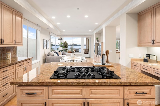 6424 Lake Washington Blvd NE Unit 34, Kirkland, WA 98033 - kitchen featuring open floor plan, black cooktop, light stone counters, a center island, and light brown cabinets
