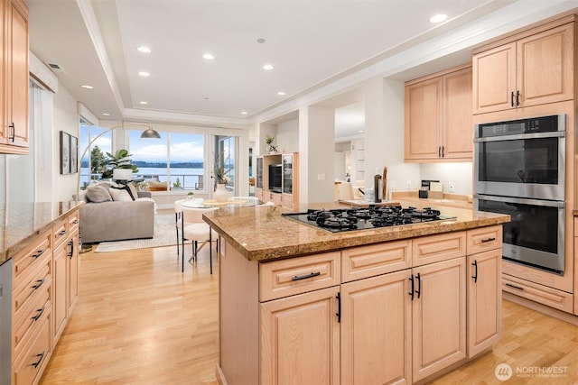 6424 Lake Washington Blvd NE Unit 34, Kirkland, WA 98033 - kitchen featuring double oven, black gas cooktop, open floor plan, light brown cabinetry, and light wood-type flooring