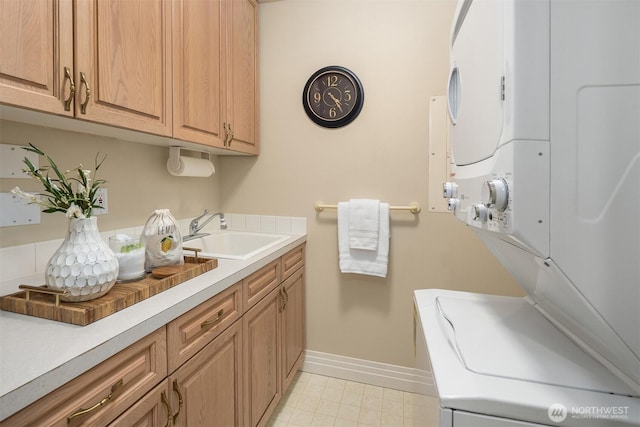6424 Lake Washington Blvd NE Unit 34, Kirkland, WA 98033 - laundry room with stacked washer / dryer and cabinet space