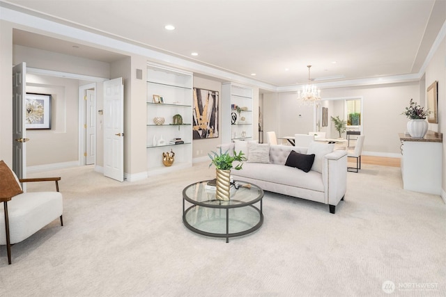 6424 Lake Washington Blvd NE Unit 34, Kirkland, WA 98033 - living area featuring light carpet, a chandelier, recessed lighting, built in shelves, and ornamental molding