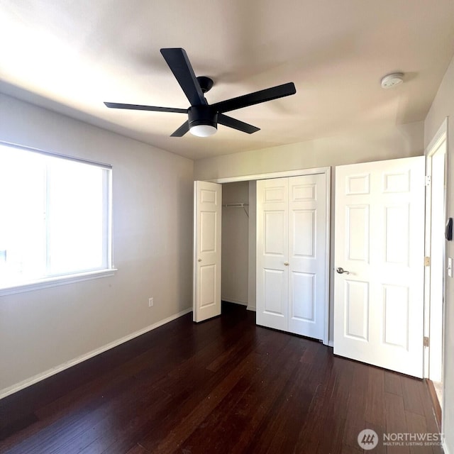 132 170th Pl SE, Bothell, WA 98012 - unfurnished bedroom featuring dark wood-type flooring, a closet, and ceiling fan