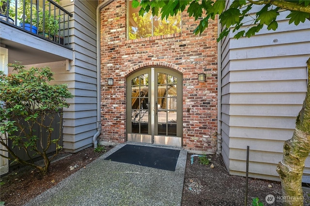 8021 234th St SW Unit 211, Edmonds, WA 98026 - view of exterior entry with brick siding and french doors