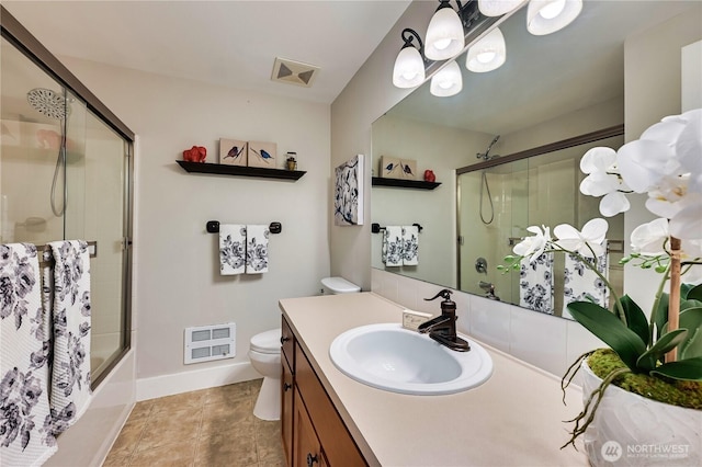 8021 234th St SW Unit 211, Edmonds, WA 98026 - full bathroom featuring vanity, bath / shower combo with glass door, and tile patterned flooring