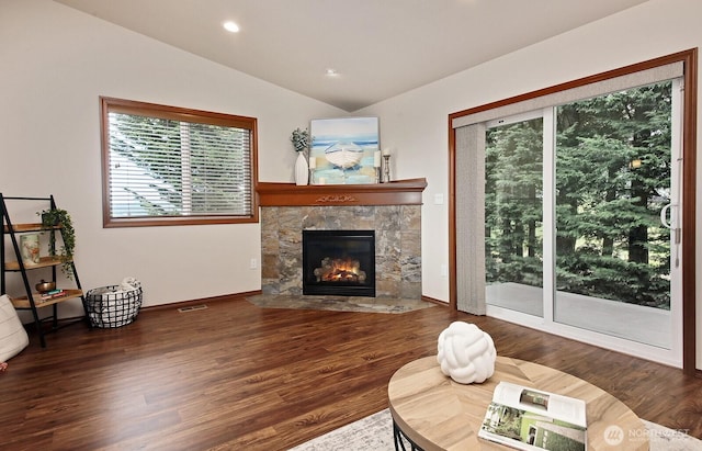 4880 Harbor Hills Dr, Freeland, WA 98249 - living area featuring a fireplace, wood finished floors, vaulted ceiling, and recessed lighting