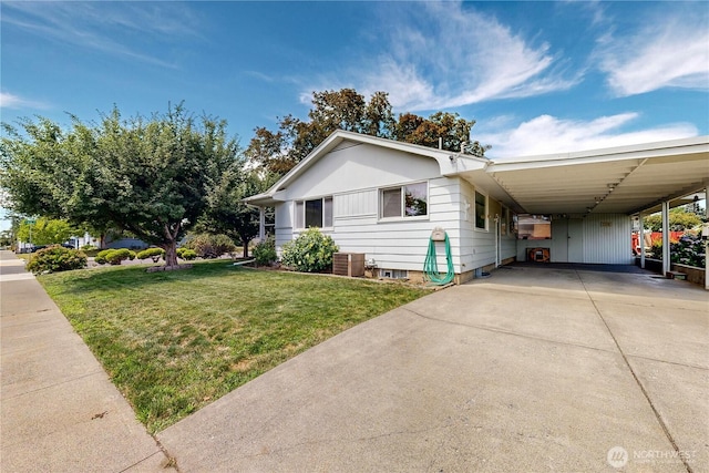 2004 Lark Dr, Walla Walla, WA 99362 - view of front facade with driveway, a carport, and a front yard