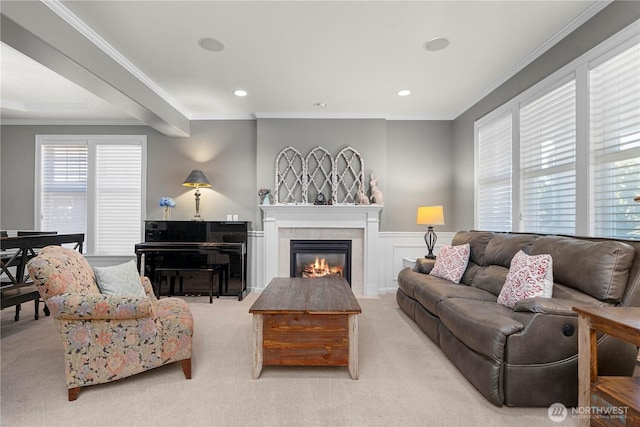 5625 Elizabeth Ave SE, Auburn, WA 98092 - living area featuring a tile fireplace, carpet, a wainscoted wall, crown molding, and recessed lighting