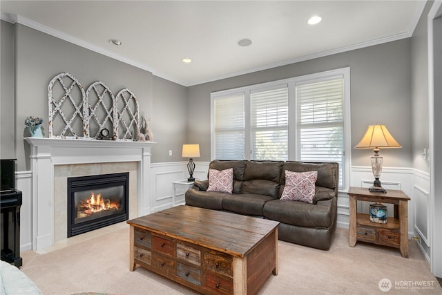 5625 Elizabeth Ave SE, Auburn, WA 98092 - living area with light carpet, a tiled fireplace, a wainscoted wall, recessed lighting, and a decorative wall