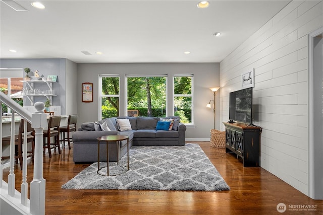 5625 Elizabeth Ave SE, Auburn, WA 98092 - living area with recessed lighting, wood finished floors, wood walls, and stairs