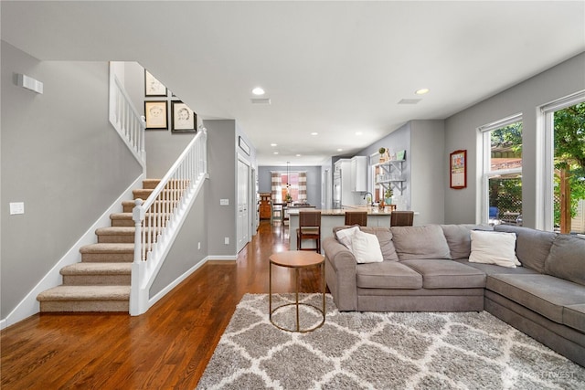 5625 Elizabeth Ave SE, Auburn, WA 98092 - living room featuring dark wood-style flooring, stairway, and recessed lighting
