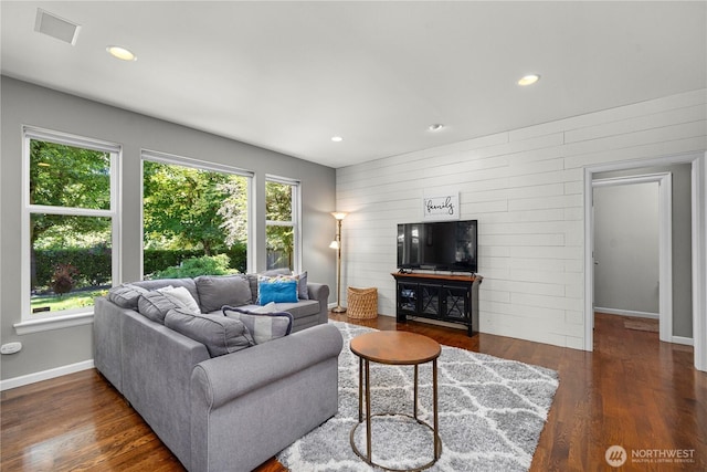5625 Elizabeth Ave SE, Auburn, WA 98092 - living area with plenty of natural light, wood finished floors, recessed lighting, and wood walls