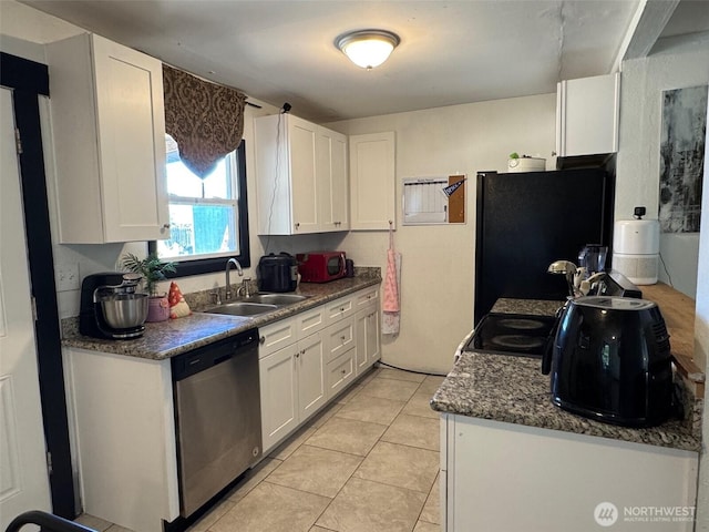 616 S Ironwood, Moses Lake, WA 98837 - kitchen with stainless steel dishwasher, freestanding refrigerator, white cabinetry, and light tile patterned floors