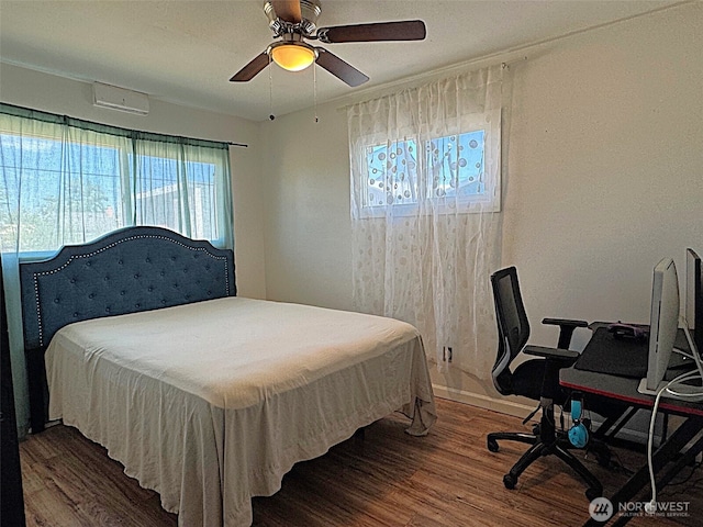 616 S Ironwood, Moses Lake, WA 98837 - bedroom featuring wood finished floors, a ceiling fan, and an office area