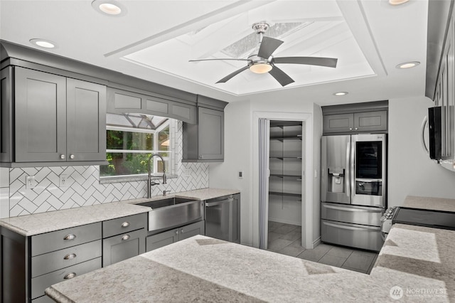 6426 Zangle Rd NE, Olympia, WA 98506 - kitchen featuring stainless steel appliances, gray cabinets, tasteful backsplash, recessed lighting, and ceiling fan