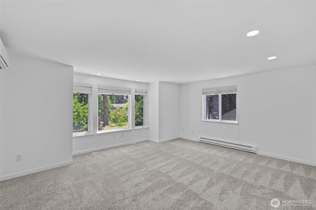 6426 Zangle Rd NE, Olympia, WA 98506 - carpeted spare room featuring baseboard heating and recessed lighting