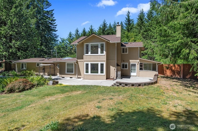6426 Zangle Rd NE, Olympia, WA 98506 - back of house with a chimney and a patio area