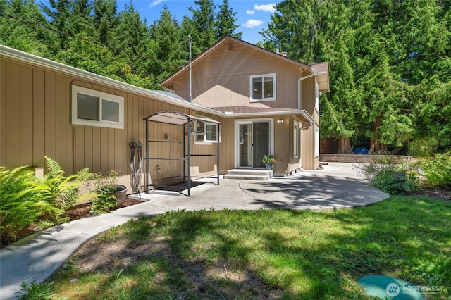 6426 Zangle Rd NE, Olympia, WA 98506 - rear view of property with a patio and a yard