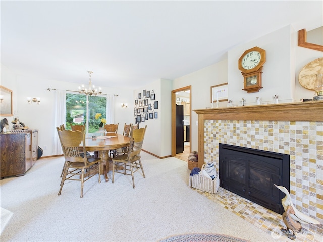 27014 80th St E, Buckley, WA 98321 - dining space featuring a chandelier, light carpet, and a tiled fireplace