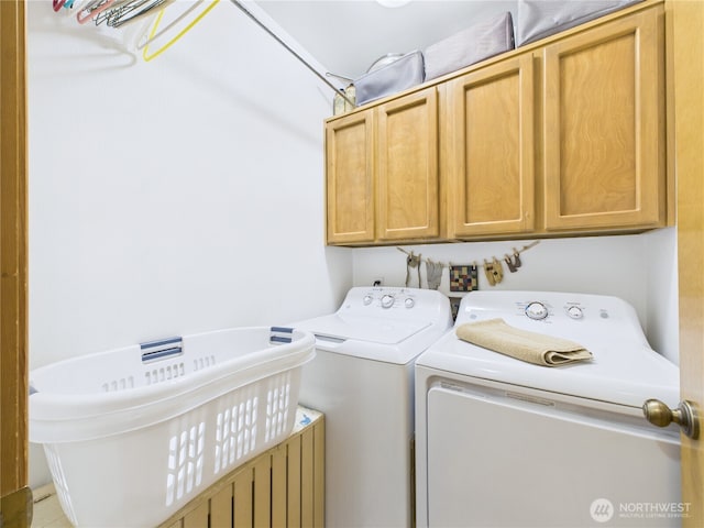 27014 80th St E, Buckley, WA 98321 - washroom featuring separate washer and dryer and cabinet space