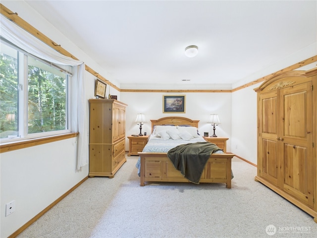 27014 80th St E, Buckley, WA 98321 - bedroom with light colored carpet and baseboards