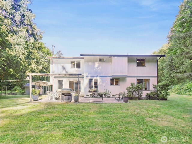 27014 80th St E, Buckley, WA 98321 - rear view of house with a patio and a yard