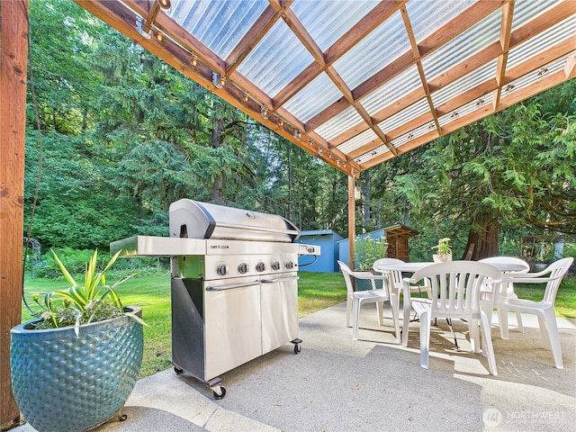 27014 80th St E, Buckley, WA 98321 - view of patio with grilling area, outdoor dining area, and a shed