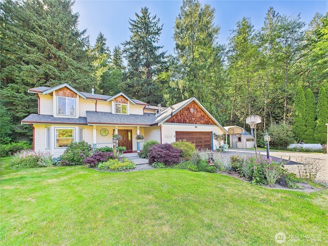 27014 80th St E, Buckley, WA 98321 - view of front facade featuring covered porch, an attached garage, a front yard, driveway, and roof with shingles