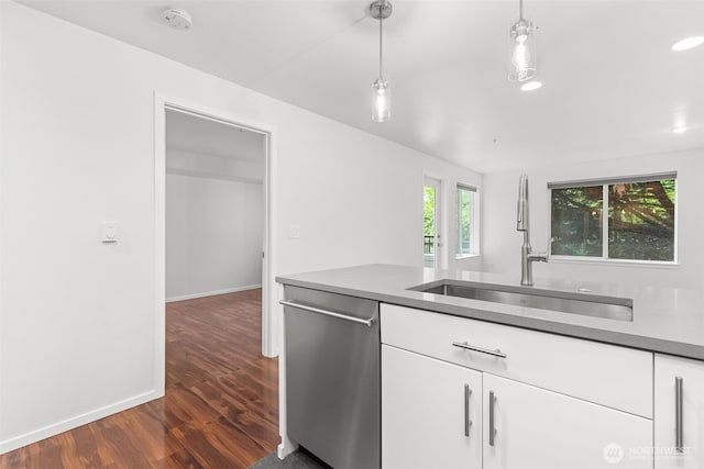 232 Belmont Ave E # 201, Seattle, WA 98102 - kitchen featuring stainless steel dishwasher, dark wood-style floors, white cabinets, pendant lighting, and recessed lighting