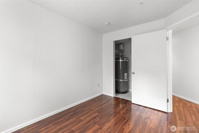 232 Belmont Ave E # 201, Seattle, WA 98102 - unfurnished bedroom with secured water heater and wood finished floors