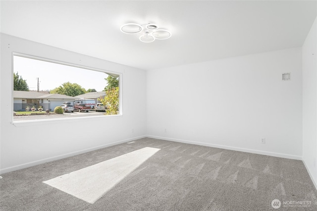 2112 S Crestmont Dr, Moses Lake, WA 98837 - carpeted spare room featuring baseboards