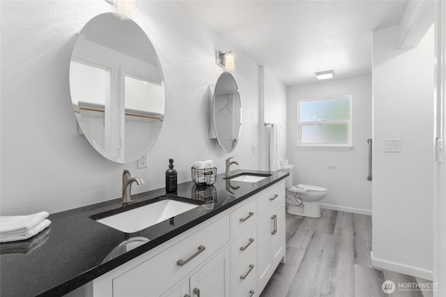2112 S Crestmont Dr, Moses Lake, WA 98837 - full bathroom with wood finished floors and double vanity