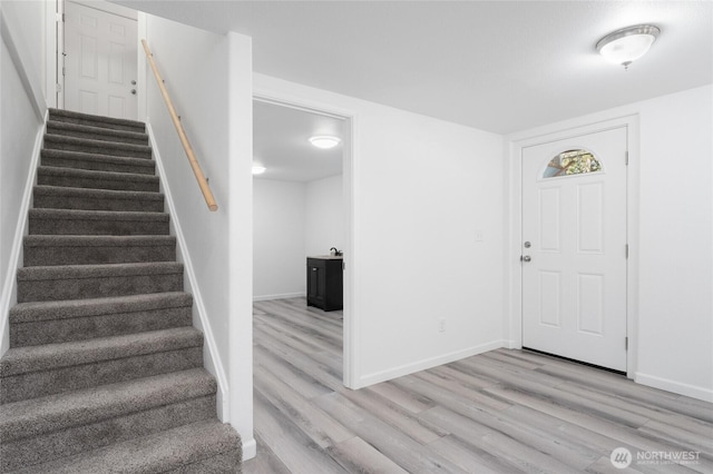 2112 S Crestmont Dr, Moses Lake, WA 98837 - foyer entrance with light wood-type flooring and stairway