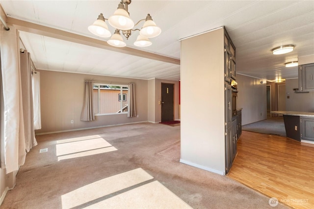 7138 Englewood Dr SE Unit 32, Olympia, WA 98513 - unfurnished room with light colored carpet and a chandelier
