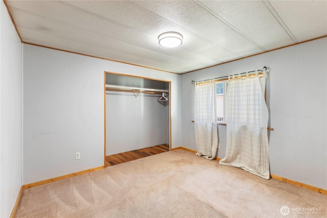 7138 Englewood Dr SE Unit 32, Olympia, WA 98513 - unfurnished bedroom featuring carpet flooring and a closet