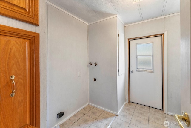 7138 Englewood Dr SE Unit 32, Olympia, WA 98513 - washroom with crown molding, light tile patterned floors, and washer hookup
