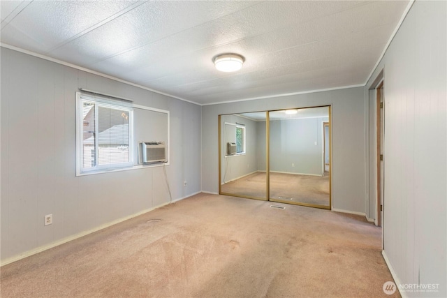 7138 Englewood Dr SE Unit 32, Olympia, WA 98513 - unfurnished bedroom with carpet floors, a closet, and ornamental molding
