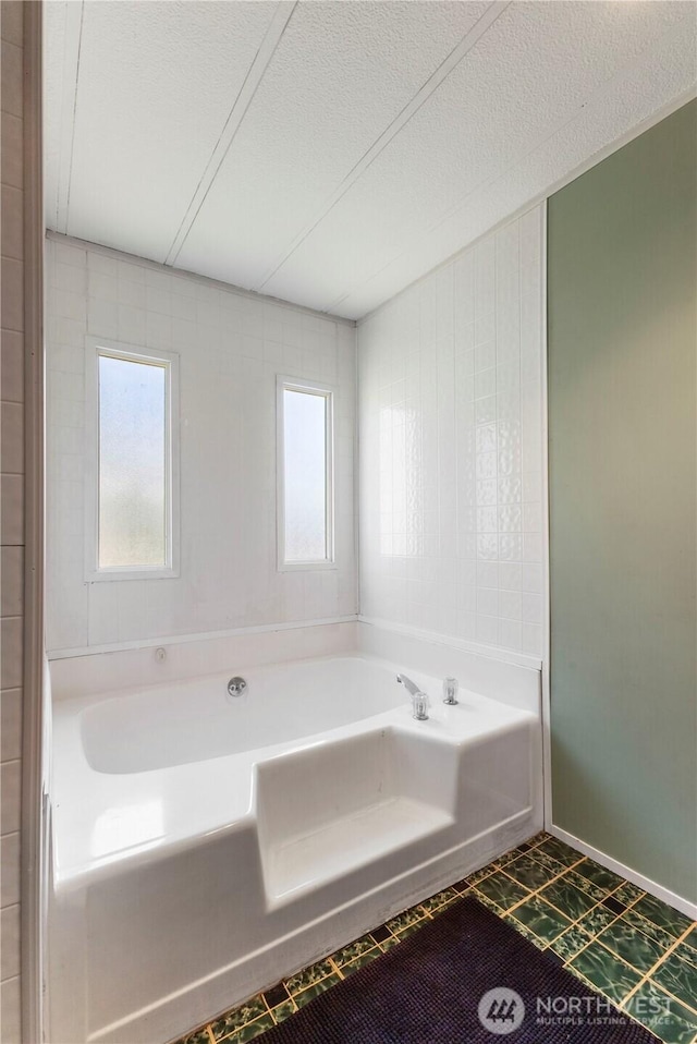 7138 Englewood Dr SE Unit 32, Olympia, WA 98513 - full bathroom featuring a garden tub and healthy amount of natural light