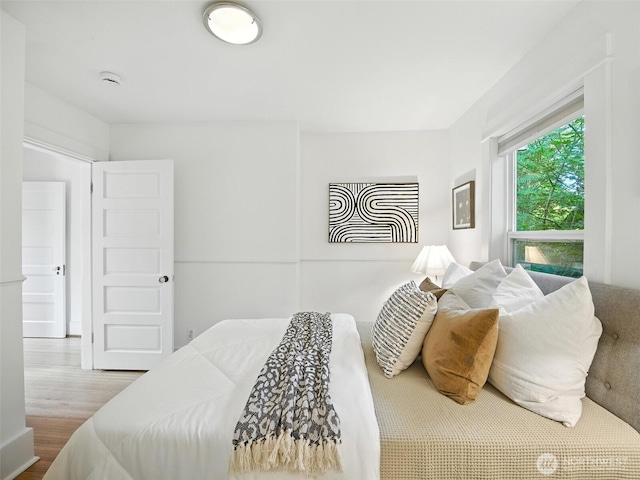 2555 Queen Anne Ave N, Seattle, WA 98109 - bedroom featuring wood finished floors