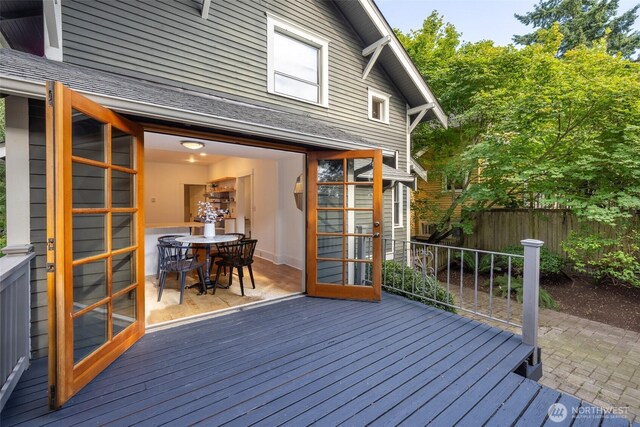 2555 Queen Anne Ave N, Seattle, WA 98109 - wooden deck featuring outdoor dining space