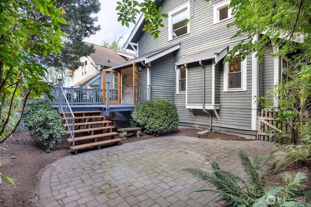 2555 Queen Anne Ave N, Seattle, WA 98109 - view of patio featuring a deck and stairs