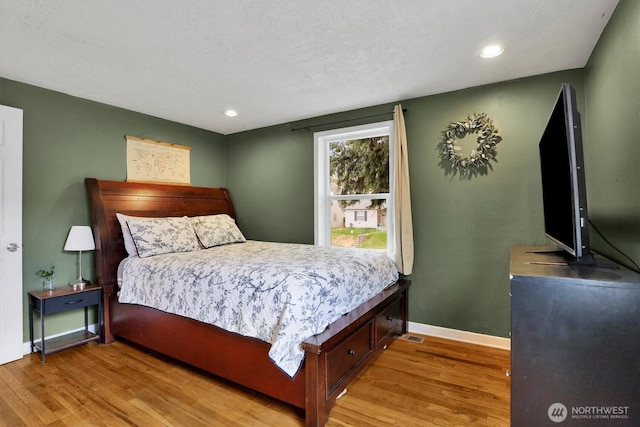 2819 W Olympic Ave, Spokane, WA 99205 - bedroom featuring wood finished floors and recessed lighting