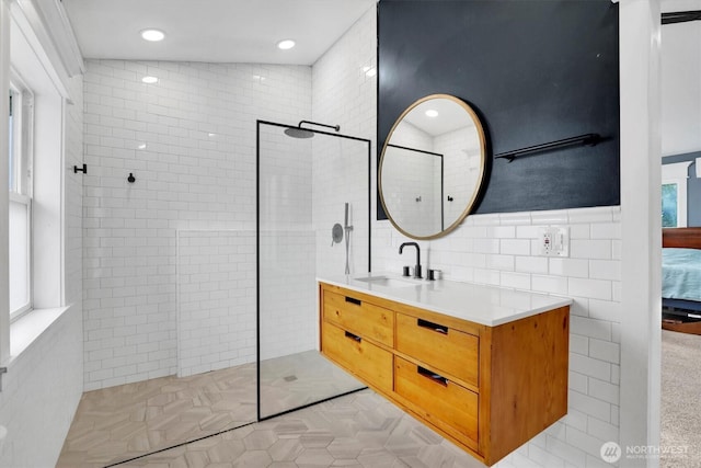 2819 W Olympic Ave, Spokane, WA 99205 - full bath featuring tile walls, walk in shower, and vanity