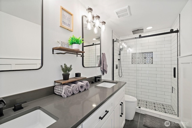 65 Kirkland Ave Unit 108, Kirkland, WA 98033 - full bathroom with a stall shower, double vanity, and recessed lighting